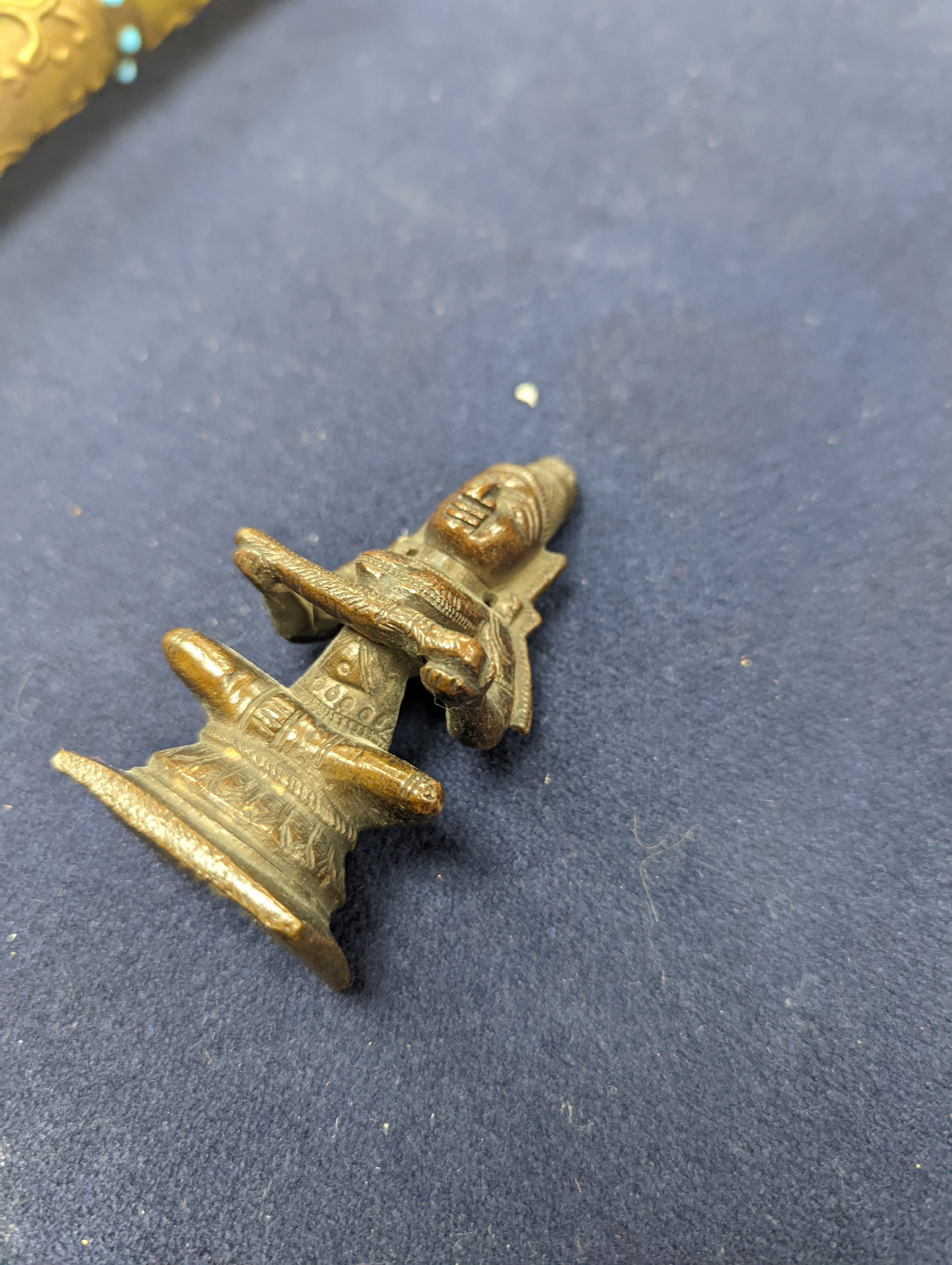 A Chinese gilt copper figure, a Chinese Dog of Fo, a bell, a censer, six Indian bronze figures and a scroll box